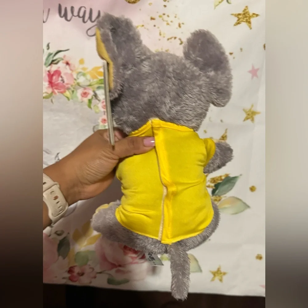 Charming Gray Elephant Toy with Yellow Accents